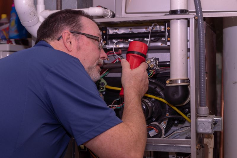 Technician Performing HVAC Check